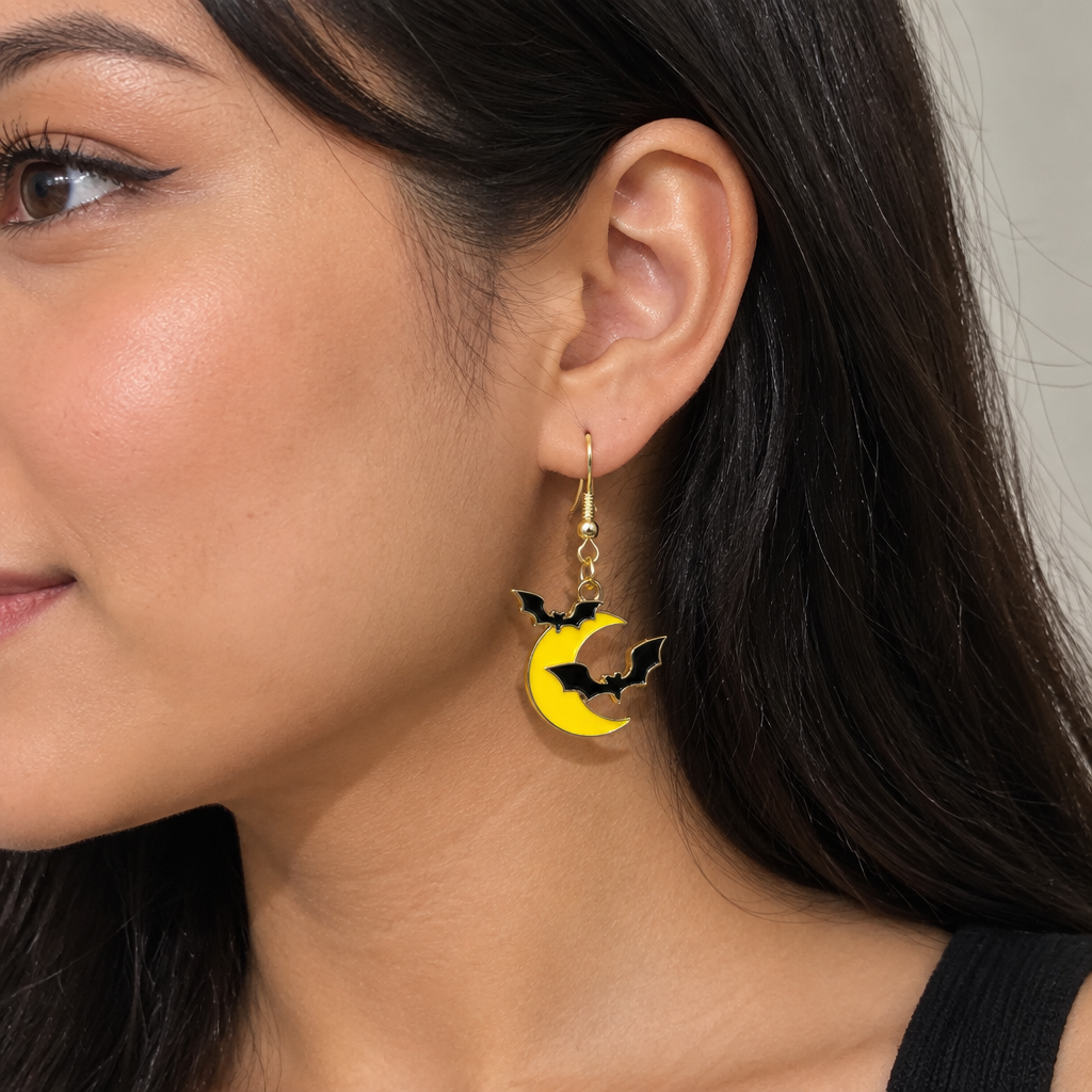 Bat and moon enamel drop earrings on kraft card