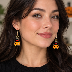 Witch hat pumpkin enamel drop earrings on kraft card
