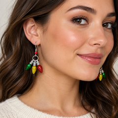 Glitter Christmas light bulb cluster drop earrings on kraft card