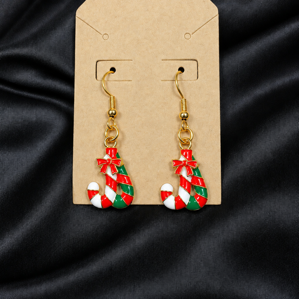 Woman wearing enamel candy cane drop earrings