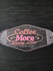 Coffee More Worry Less black rainbow glitter oval motel-style keychain with pink retro script lettering and sparkle star accents