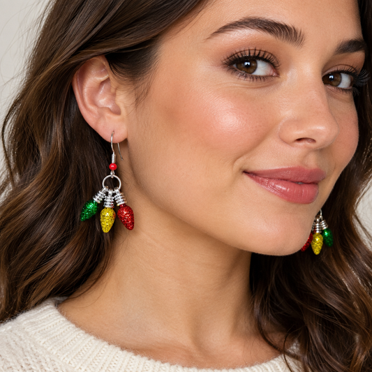 Glitter Christmas light bulb cluster drop earrings on kraft card