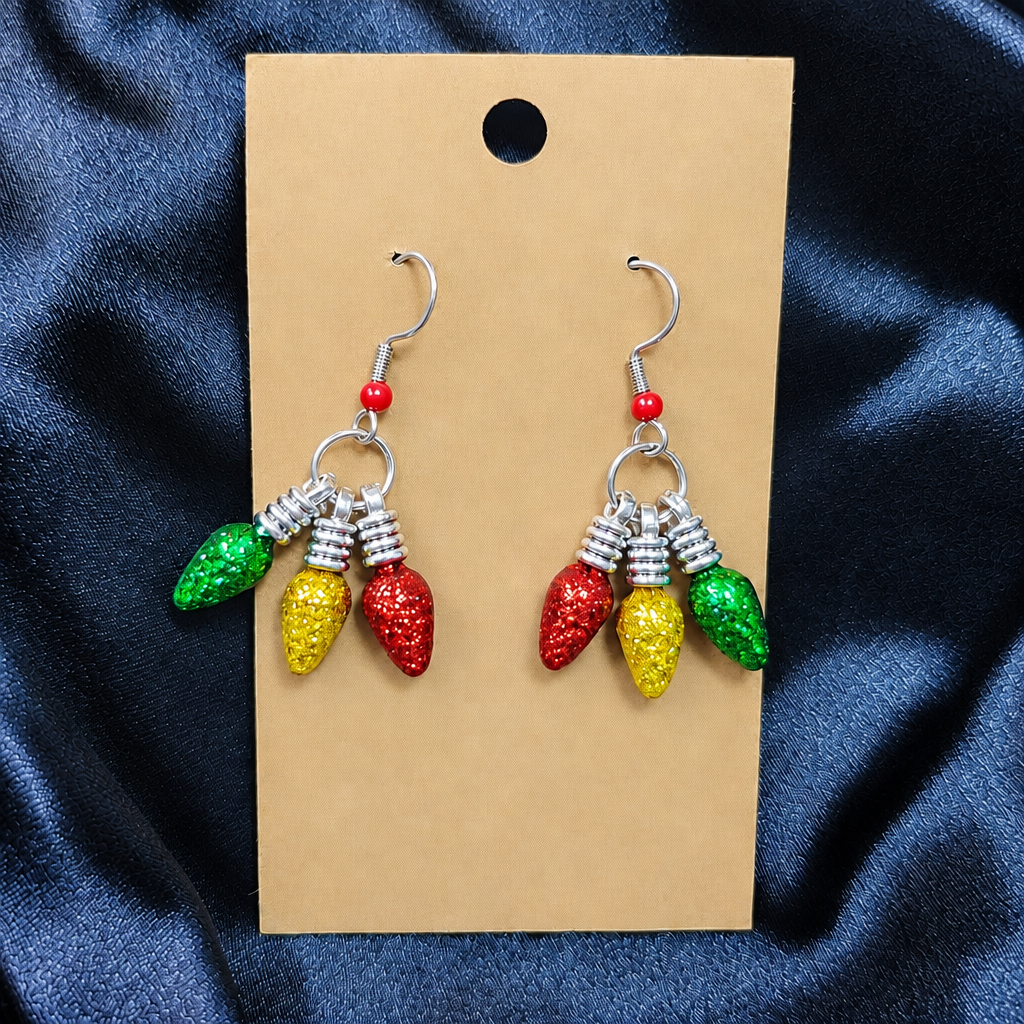 Woman wearing glitter Christmas light bulb cluster drop earrings