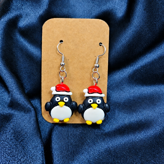 Christmas penguin Santa hat drop earrings on kraft card