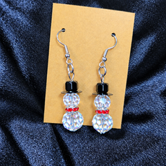 Crystal snowman beaded drop earrings on kraft card