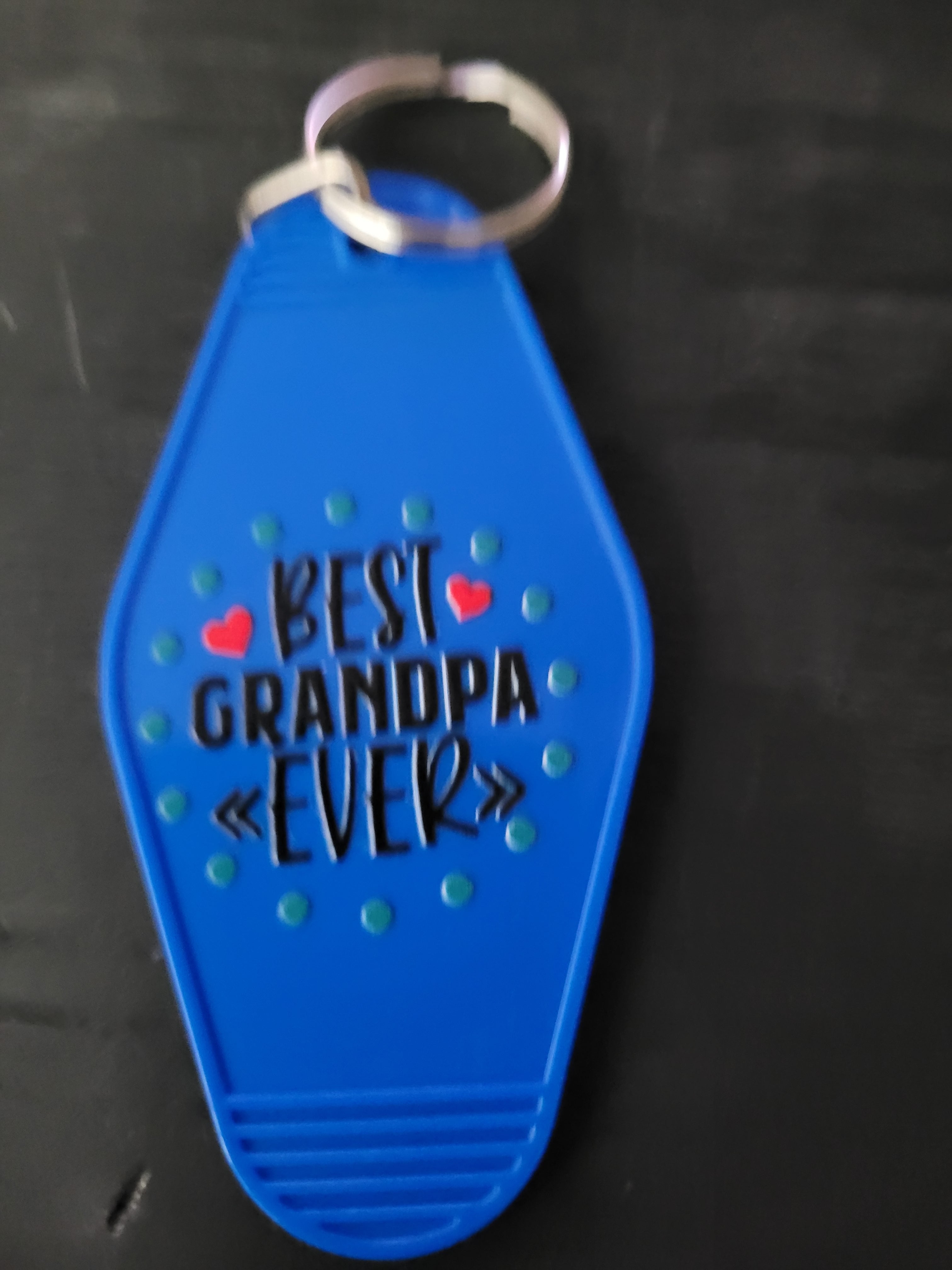 Best Grandpa Ever blue motel-style keychain with red hearts
