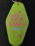 Hold On Let Me Overthink This neon green motel-style keychain with pink and blue lettering