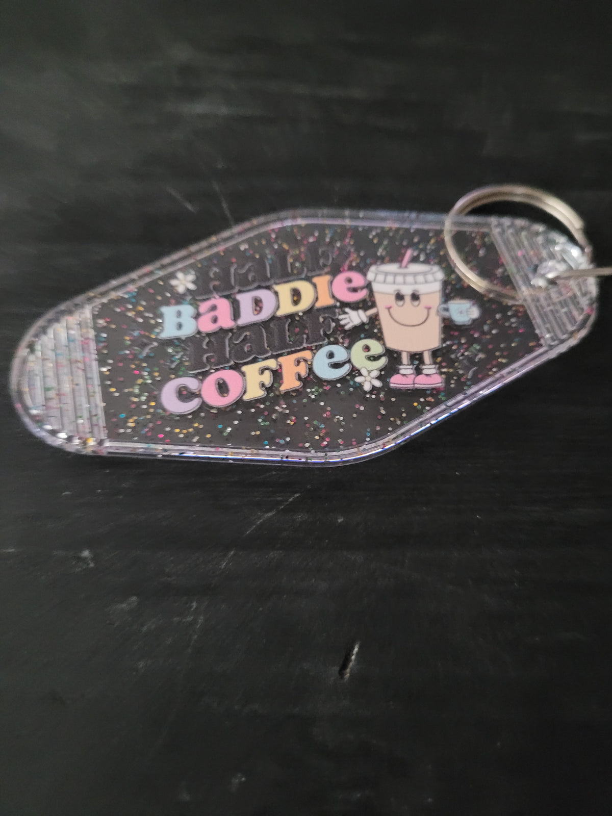 Baddie Coffee clear glitter motel-style keychain with pastel lettering and smiley coffee cup character