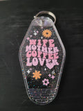 Wife Mother Coffee Lover clear glitter motel-style keychain with pink lettering and daisy accents