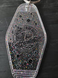 Dead Inside But Caffeinated clear rainbow glitter motel-style keychain with skeleton and coffee bean cutouts
