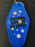 Emotional Support Iced Coffee royal blue motel-style keychain with smiley face, pastel daisies and gold sparkle stars