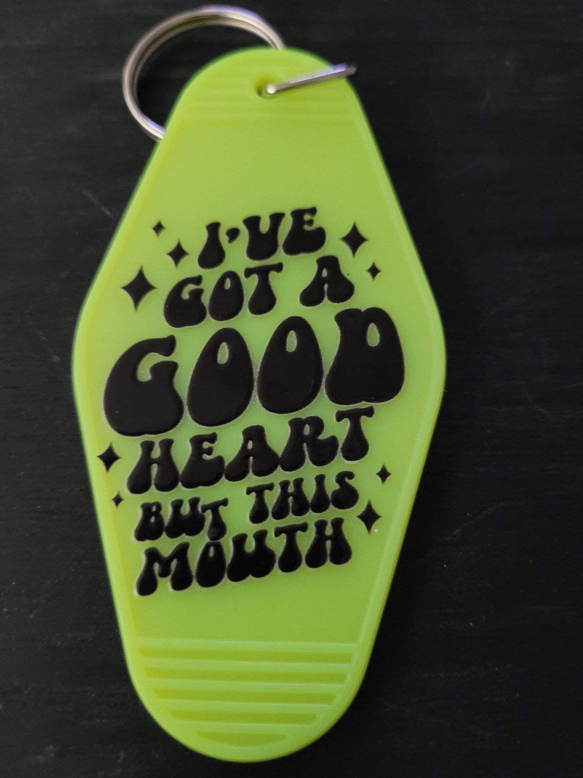 I've Got A Good Heart But This Mouth neon yellow-green motel-style keychain with chunky black groovy lettering and sparkle diamonds
