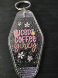 Iced Coffee Girly black rainbow glitter motel-style keychain with pink script lettering, white daisies and coffee cup charm