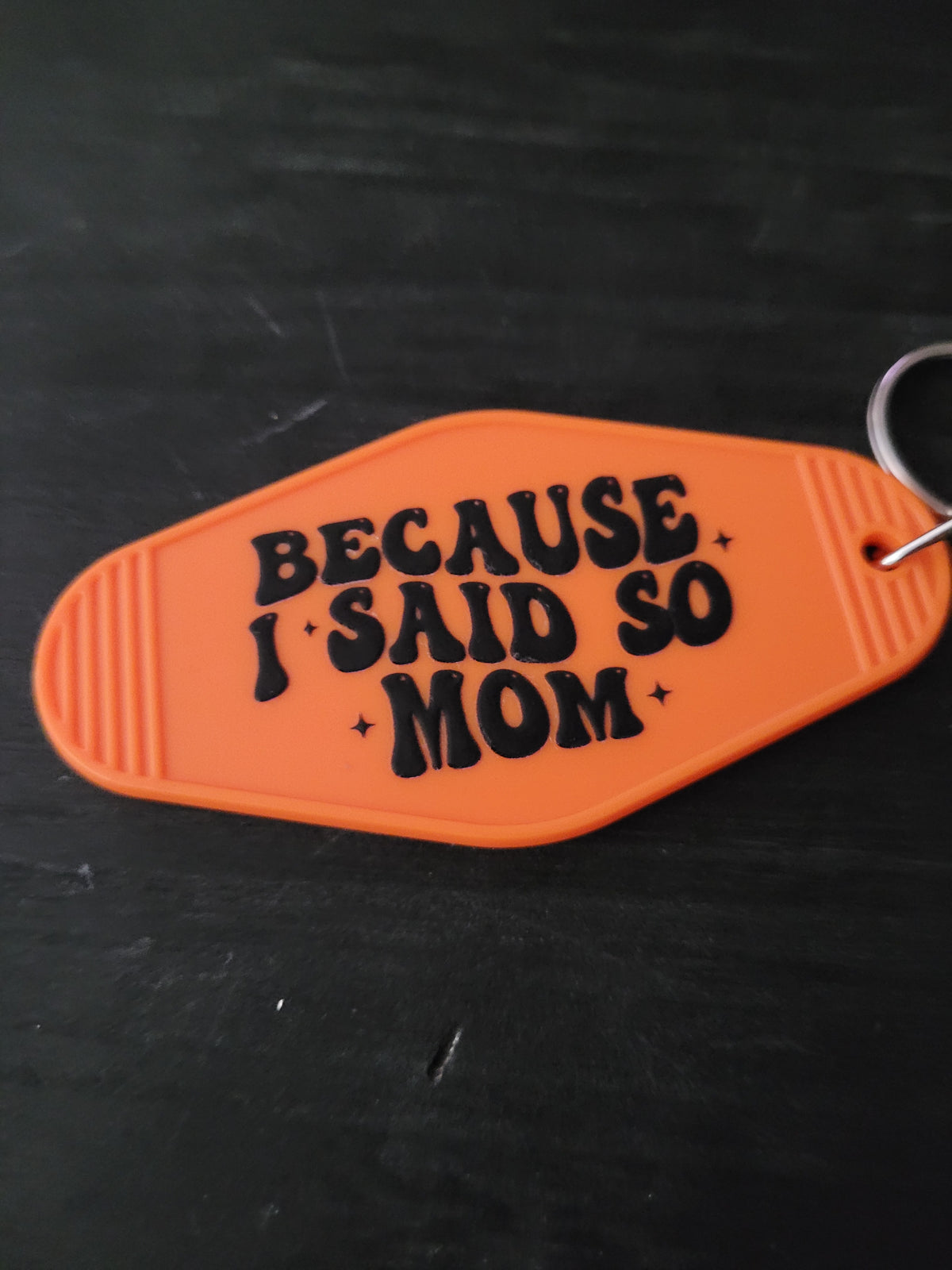 Because I Said So Mom bold orange motel-style keychain with chunky black groovy lettering and sparkle star accents
