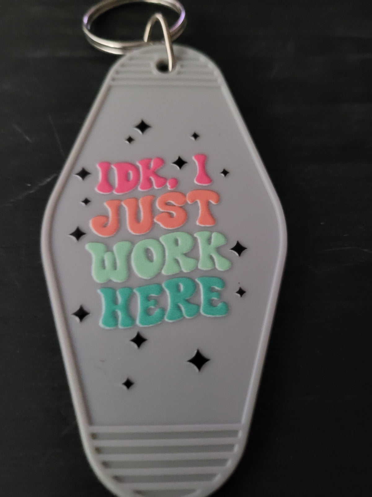 IDK I Just Work Here gray motel-style keychain with colorful groovy lettering in pink coral mint and teal with sparkle diamond cutouts