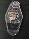 I Take My Coffee On The Rocks clear rainbow glitter motel-style keychain with smiley iced coffee cup and white daisy accents